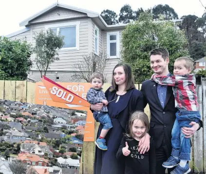  ?? PHOTOS: PETER MCINTOSH ?? Sold . . . After eight months of attending open homes and having their offers rejected, the Cullen family Addison (2), Rebecca, Viola (6), Richie and Kaia (4) will finally move into a home of their own at the end of the month. Their story is a familiar...