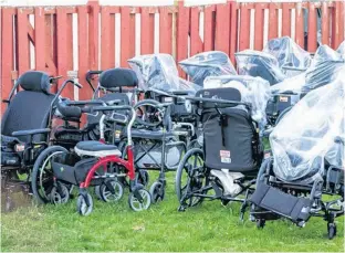  ?? POSTMEDIA NEWS ?? Wheelchair­s belonging to some of the residents of Camilla Care Community long-term care facility in Mississaug­a, Ont., who have lost their lives due to COVID-19.