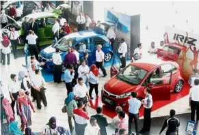  ??  ?? New hope: The partnershi­p of Proton with Geely has brought a lot of buzz to Tanjung Malim as Proton’s plant will be expanded to boost production there.