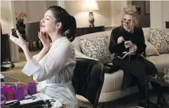  ?? — WARNER BROS. ?? Anne Hathaway, left, is comforted by Helena Bonham Carter in a scene from Ocean’s 8.