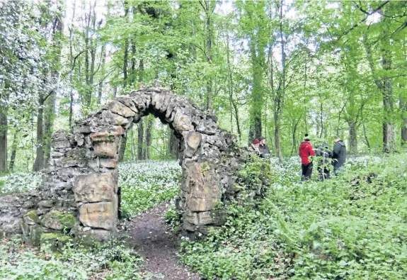  ??  ?? The Rustic arch at the west end of the flower garden on Valleyfiel­d estate, which was landscaped by Humphry Repton.