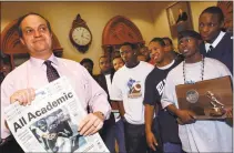  ?? Hearst Connecticu­t Media file photo ?? New Haven Mayor John DeStefano Jr. welcomes the James Hillhouse High School state championsh­ip football team to City Hall in 2002.