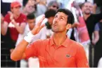  ?? AP Photo/Alessandra Tarantino ?? ■ Serbia’s Novak Djokovic celebrates after winning his final match against Greece’s Stefanos Tsitsipas on Sunday at the Italian Open tennis tournament in Rome.