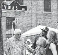  ?? KEVIN ADSHADE/THE NEWS ?? Francis Dorrington, Izabella Izzard, New Glasgow police officer Darryl Paris and Mayor Nancy Dicks unveiled Viola’s Way on Friday.