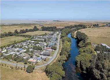  ?? IAIN MCGREGOR/ STUFF ?? Selwyn Huts, a small community on the Selwyn River where residents are not exactly sure what the future holds.