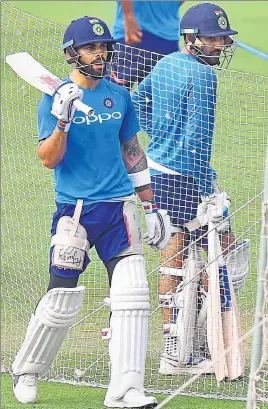  ?? PTI ?? India captain Virat Kohli and Rohit Sharma during nets at the Eden Gardens on Tuesday. The first Test begins in Kolkata on Thursday.