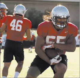  ?? JASON OGULNIK/ LAS VEGAS REVIEW-JOURNAL ?? Linebacker Tau Lotulelei (55) during football practice Oct. 11, 2016, at UNLV’s Rebel Park. Lotulelei was back at Rebel Park on Tuesday, hoping to impress the dozen NFL scouts attending UNLV Pro Day.