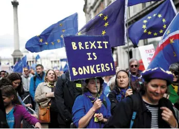  ??  ?? LOUD AND CLEAR: Protesters on the anti-Brexit ‘Let Us Be Heard’ take to London streets
