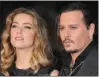  ?? ?? Amber Heard and Johnny Depp appear at an event in 2015.