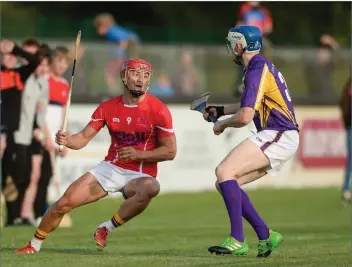 ??  ?? FLASHBACK TO AUGUST 15: Wexford’s Lee Chin, representi­ng Davy Russell’s Best, in action against Kilkenny’s TJ Reid, representi­ng Jim Bolger’s Stars, during the sixth annual Hurling for Cancer Research game in aid of the Irish Cancer Society.