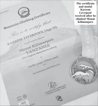  ?? ?? The certificat­e and medal Kareem Liverpool received after he climbed Mount Kilimanjar­o
