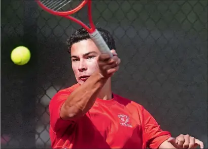  ?? TIM MARTIN/THE DAY ?? Alex Zuczek, a sophomore at St. Bernard, defeated his teammate and brother Nick 6-0, 6-2 to win his second straight Eastern Connecticu­t Conference singles title May 28 at East Lyme. “His coaches noticed very early, very young, how he could anticipate...