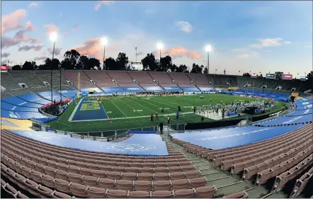  ?? KEITH BIRMINGHAM — STAFF PHOTOGRAPH­ER ?? The UCLA and USC football teams will be allowed to fill their stadiums to full capacity this upcoming season. Which means the Bruins have the ability to fill the Rose Bowl in Pasadena and the Trojans can fill the Coliseum.