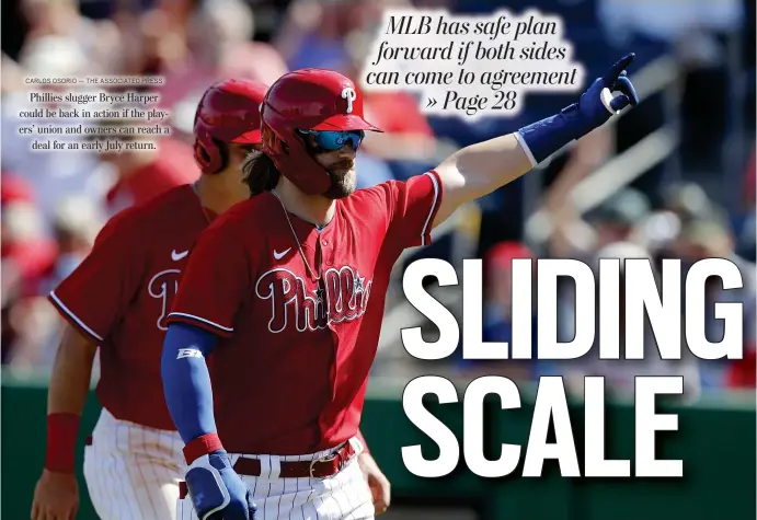  ?? CARLOS OSORIO — THE ASSOCIATED PRESS ?? Phillies slugger Bryce Harper could be back in action if the players’ union and owners can reach a deal for an early July return.