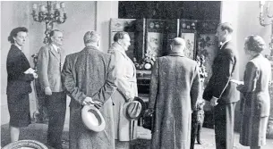  ?? BRUNO LOHSE PAPERS THE NEW YORK TIMES ?? In this undated image, Bruno Lohse, second from right, leads Hermann Goring, centre, once Adolf Hitler’s right-hand man, on a tour of seized artworks.