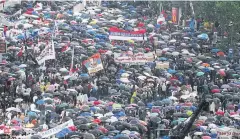  ?? ?? SHOW OF POWER: Supporters of Serbia’s president take part in a pro-government rally in Belgrade on Friday.