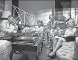  ?? Zeitgeist Films ?? GIANNI DI GREGORIO portrays dutiful son to Valeria de Franciscis Bendoni, in curly wig. Kristina Cepraga, second from right, is caretaker. With Lilia Silvi.