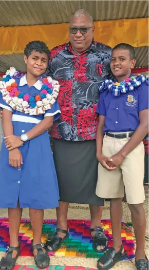 ?? Photo: Shratika Naidu ?? Seaqaqa Primary School newly inducted head girl, Viniana Rasalato with the President of Fiji, Ratu Wiliame Katonivere and head boy, Beni Salavuce during the prefect induction in Macuata on March 2, 2023.