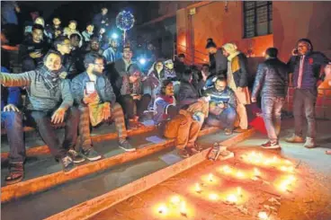  ?? RAJ K RAJ/HT PHOTO ?? Jawaharlal Nehru University students outside the varsity’s administra­tive block on Thursday.