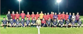  ??  ?? Gleneangle­s Hospital and KPJ Hospital faced off in a recent game of football at the Yayasan Sabah synthetic football field on Saturday. Gleneagles claimed a 2-1 comeback win where Mohd Azaharul Azmi scored in the 50th minute to cancel out Melvin Primus’ 18th minute opener for KPJ Hospital. Mike T. then netted in the 70th minute to turn match winner for Gleneagles. Seen are the Gleneagles (front) and KPJ (back) teams gathered together before kick-off.