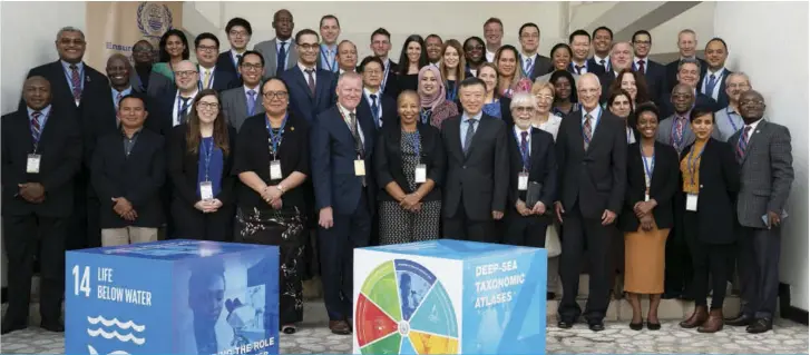  ??  ?? On February 12th 2020, Ambassador TIAN Qi (6th from right front row), Chinese Ambassador and Permanent Representa­tive to ISA, and Mr. Michael Lodge (5th from left front row), Secretary-general of ISA, attended the first ever internatio­nal workshop on “Capacity developmen­t, resources and needs assessment” held by ISA. Here both men are seen with delegates.