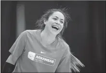  ?? NWA Democrat-Gazette/BEN GOFF • @NWABENGOFF ?? Arkansas senior libero Okiana Valle laughs Wednesday during practice.