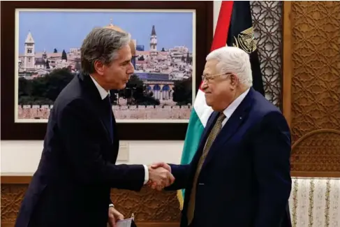  ?? (AFP/Getty) ?? Palestinia­n leader Mahmoud Abbas and Antony Blinken in Ramallah yesterday