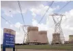  ?? | NADINE
HUTTON Bloomberg ?? Electricit­y power lines and cooling towers at Eskom Holdings Ltd’s Kendal coal-fired power station in Delmas.