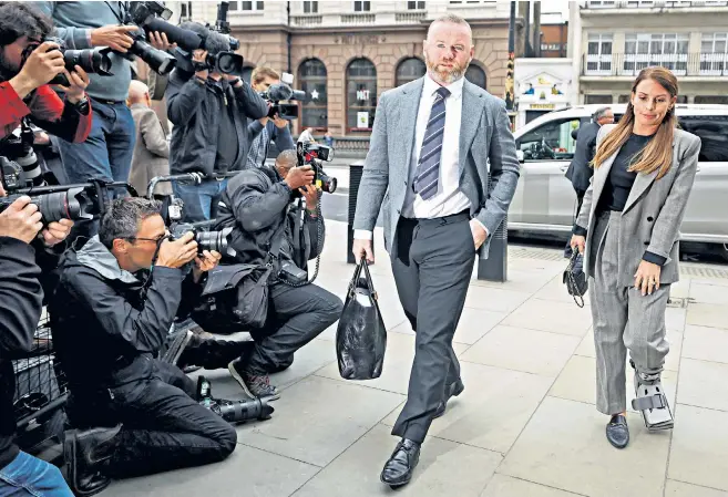  ?? ?? Coleen Rooney arrives at the High Court in London, with her husband Wayne, to give evidence in the libel case brought by Rebekah Vardy, inset