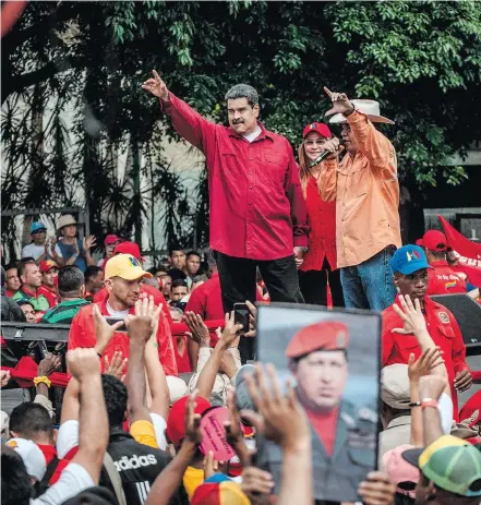  ?? MERIDITH KOHUT / THE NEW YORK TIMES ?? Em risco. Maduro discursa para apoiadores em Caracas: pandemia e preço do petróleo pressionam regime chavista