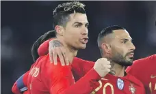  ?? AFP ?? Cristiano Ronaldo, left, is often the beneficiar­y when it comes to well-placed passes from his friend Ricardo Quaresma, right