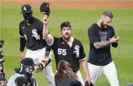  ?? DAVID BANKS/AP ?? Rodon celebrates his no-hitter with his White Sox teammates in April 2021. The team didn’t offer him a contract the next offeseason.