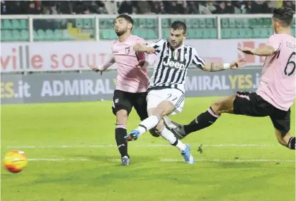  ??  ?? PALERMO: Juventus’ Stefano Sturaro scores a goal, during the Serie A soccer match between Palermo and Juventus, in Palermo, Italy, Sunday. — AP