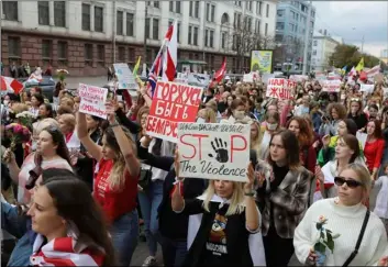  ?? AP Photo ?? Women march during an opposition rally to protest the official presidenti­al election results in Minsk, Belarus, on Saturday.