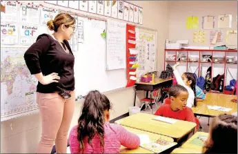  ?? RACHEL DICKERSON/MCDONALD COUNTY PRESS ?? First-grade teacher and native Spanish speaker Mariela Hurtado teaches Spanish to a group of second-graders at Noel Primary School. She teaches Spanish classes to first and second grades at the school.