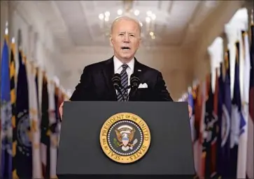  ?? Andrew Harnik Associated Press ?? “AFTER ONE FULL YEAR, there is hope and light for better days ahead,” President Biden said on the anniversar­y of the COVID-19 pandemic declaratio­n. He spoke shortly after signing Democrats’ huge relief package.