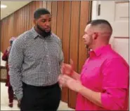  ?? BOB KEELER- DIGITAL FIRST MEDIA ?? NFL football player Devon Still, left, this year’s speaker at Indian Creek Foundation’s Celebrity Event, talks with Christian Jones before the presentati­on. Jones is one of the organizers of the annual The Wolfpack Fights Cancer fundraiser to fight...