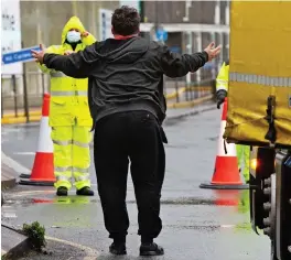  ??  ?? Anger: A lorry driver pleads his case at the Port of Dover