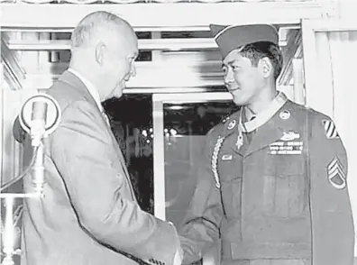  ?? DEPARTMENT OF DEFENSE ?? President Dwight Eisenhower presented the Medal of Honor to Hiroshi Miyamura in 1953 at the White House. Now 92, Miyamura isn’t finished serving his country.