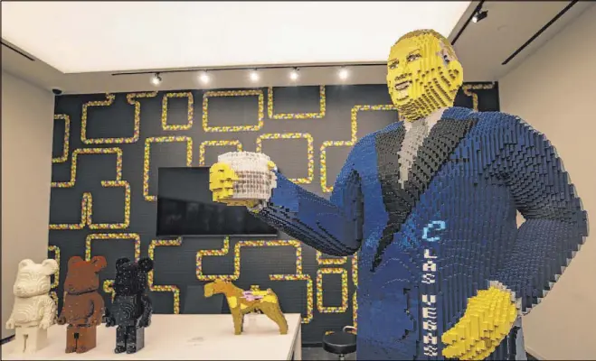  ?? Benjamin Hager Las Vegas Review-Journal@benjaminhp­hoto ?? A life-size sculpture of casino owner Derek Stevens and other creations by Lego artist Chris Ihle are on display in his gallery at Circa.