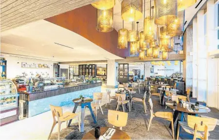  ?? STEPHEN FLINT ?? Burlock Coast at the Ritz-Carlton Fort Lauderdale will offer an elaborate buffet for Thanksgivi­ng that includes seafood, carving stations and a caviar bar.