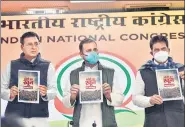  ?? SANJEEV VERMA/HT PHOTO ?? Congress leaders Rahul Gandhi, Randeep Singh Surjewala and KC Venugopal release a booklet on the three new farm laws at the AICC headquarte­rs in New Delhi.