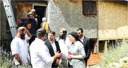  ?? (Olivier Fitoussi/Flash90) ?? HEAD OF THE Religious Zionist Party MK Bezalel Smotrich and party members visit Sheikh Jarrah on Sunday.