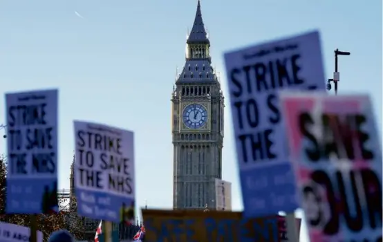  ?? KIN CHEUNG/ASSOCIATED PRESS ?? Nurses in England, Wales, and Ireland may stage the biggest strike in the history of the Royal College of Nursing.