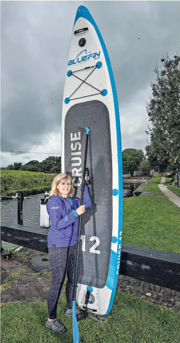  ??  ?? Home and dry: Jo Moseley is planning to become a paddleboar­d instructor to give something back