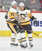  ?? ERIC HARTLINE/USA TODAY SPORTS ?? Pittsburgh’s Sidney Crosby, right, and Evgeni Malkin return at ages 34 and 35, respective­ly.