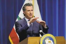  ?? Rich Pedroncell­i / Associated Press ?? Gov. Gavin Newsom credited measures California has taken in the past month for declines in coronaviru­s case numbers.