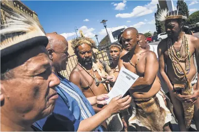  ?? Picture: Jacques Nelles ?? AGGRIEVED. Minister in the Presidency Jeff Radebe meets the group of Khoisan people who have been camping on the lawns of the Union Buildings.