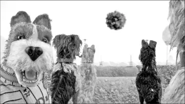  ??  ?? Murray, left, as ‘Boss' in ‘Isle of Dogs'. — Courtesy of Fox Searchligh­t Pictures