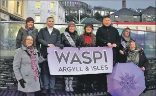  ??  ?? Councillor­s Kieron Green and Roddy McCuish joined the purple WASPI campaign.